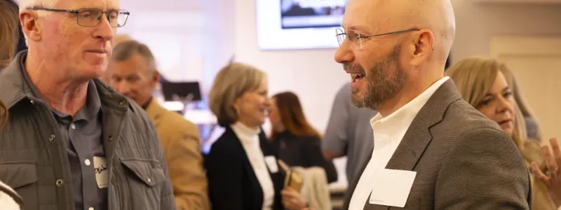 Men talking at Harvest Desoto.