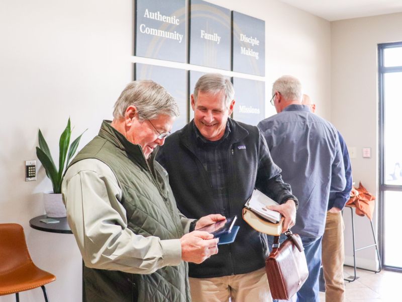 Men talking at Harvest Desoto.