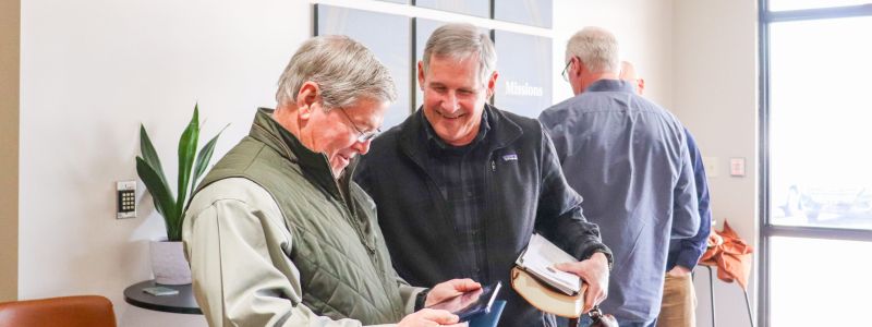 Men talking at Harvest Desoto.